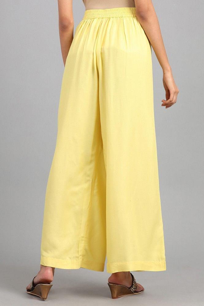 Yellow Solid Flared Pants - wforwoman
