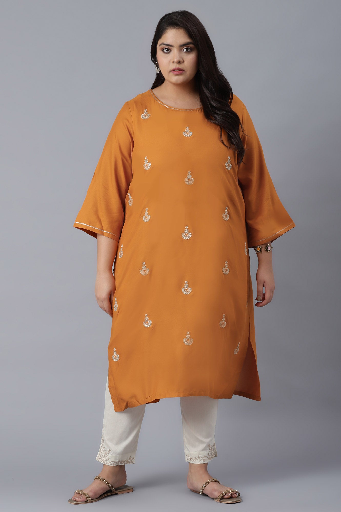 Orange kurta with Buti Embroidery