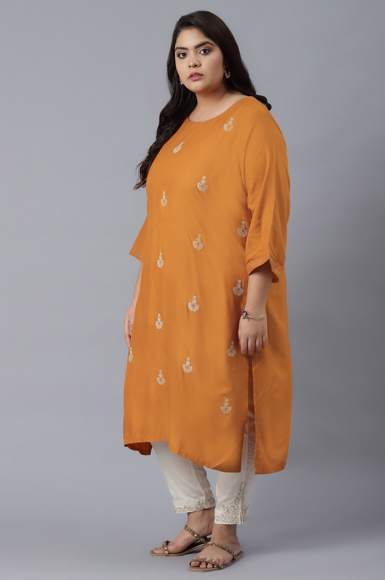 Orange kurta with Buti Embroidery