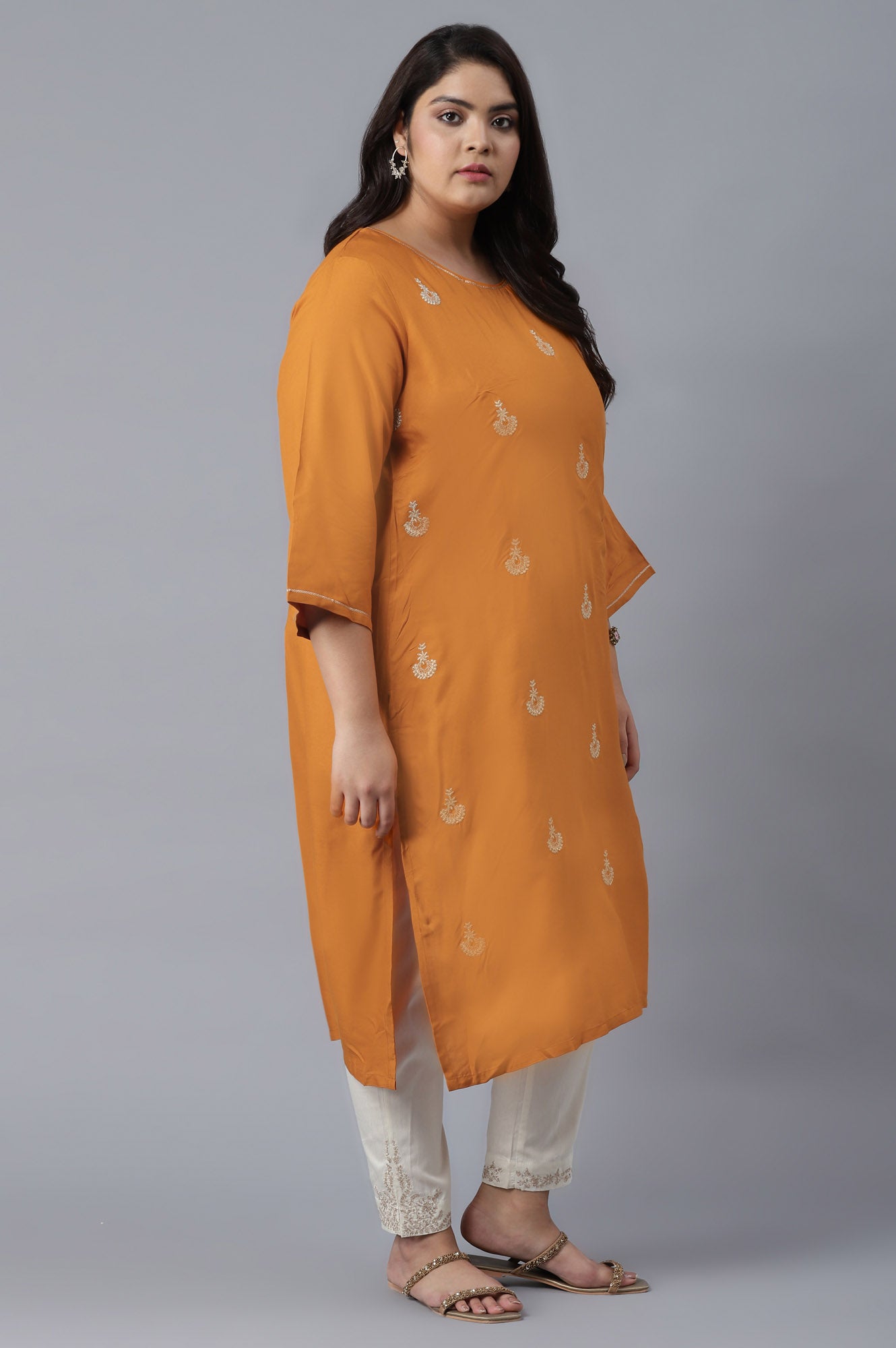 Orange kurta with Buti Embroidery