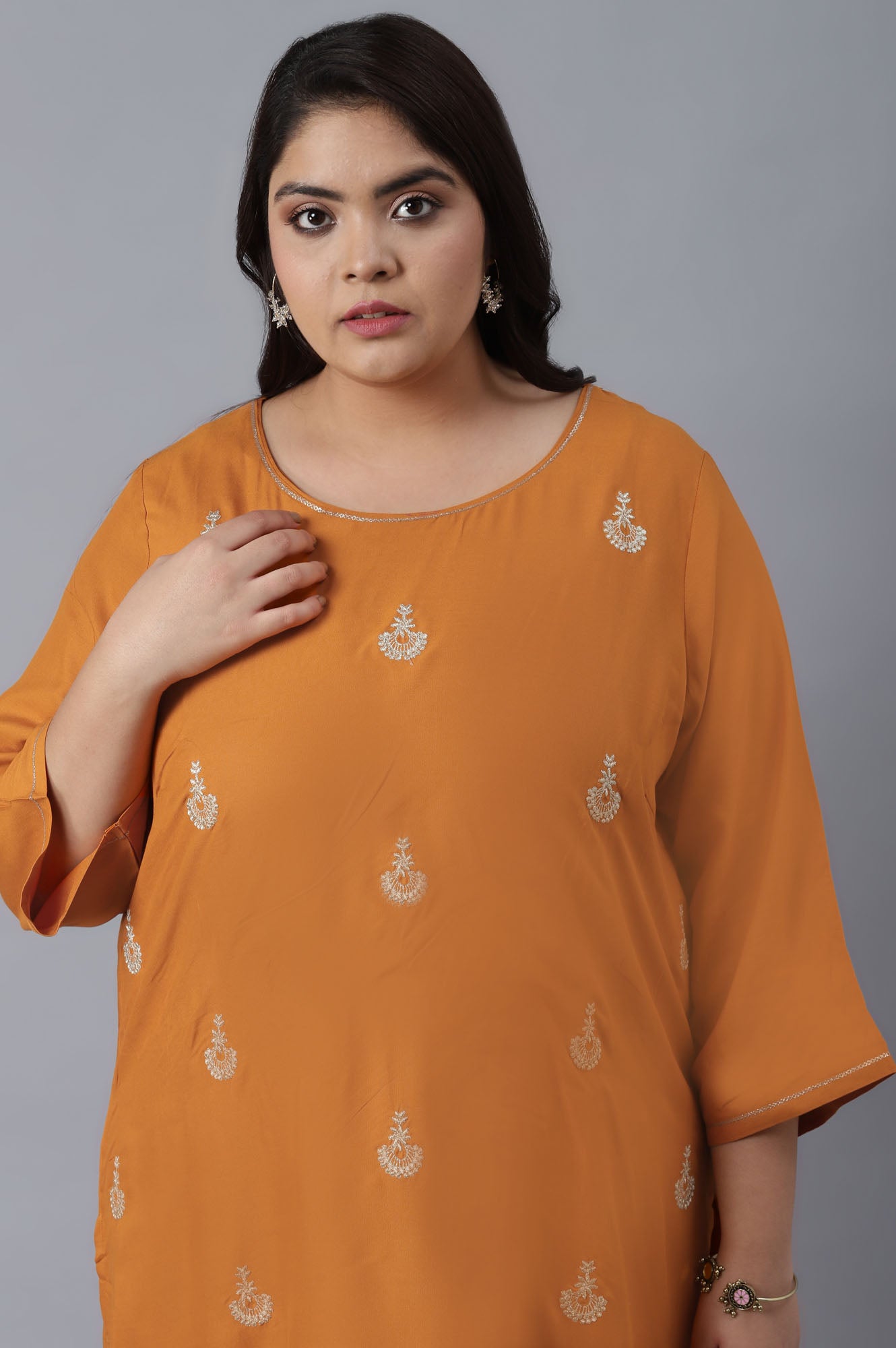 Orange kurta with Buti Embroidery