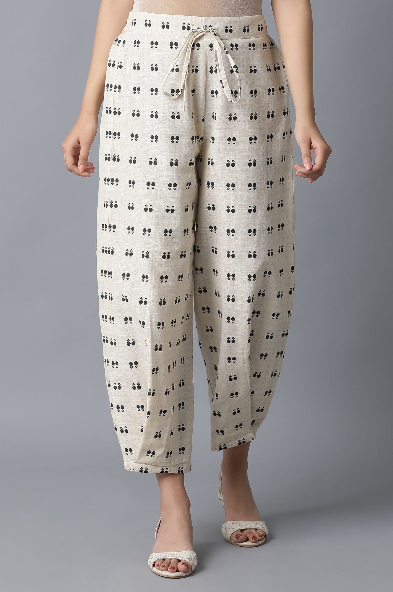 Ecru Ikkat Printed Carrot Pants