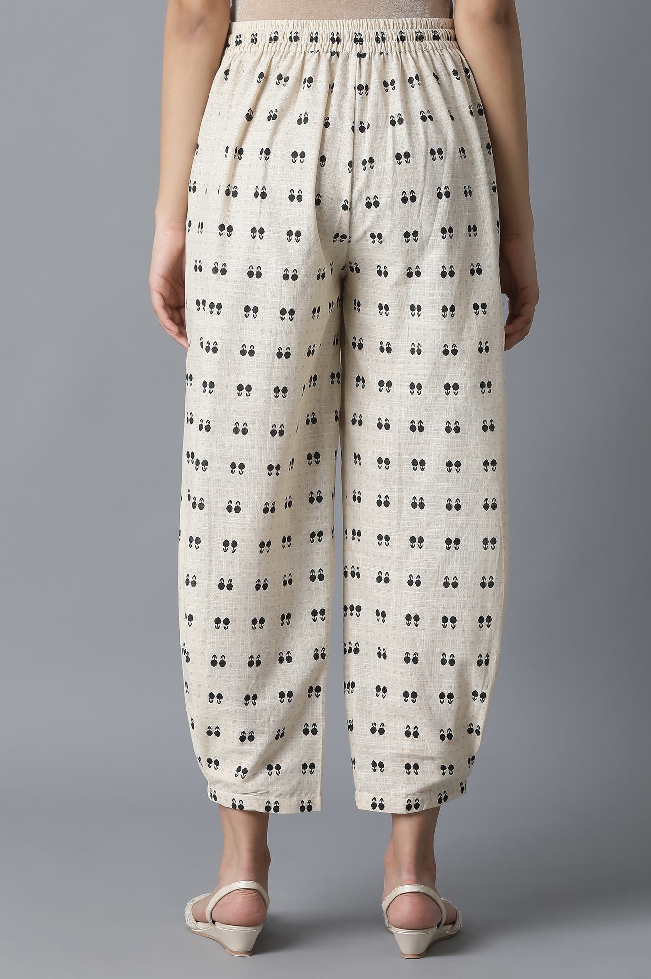 Ecru Ikkat Printed Carrot Pants