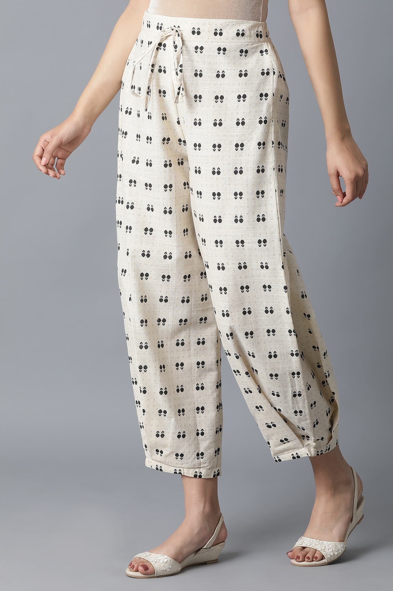 Ecru Ikkat Printed Carrot Pants