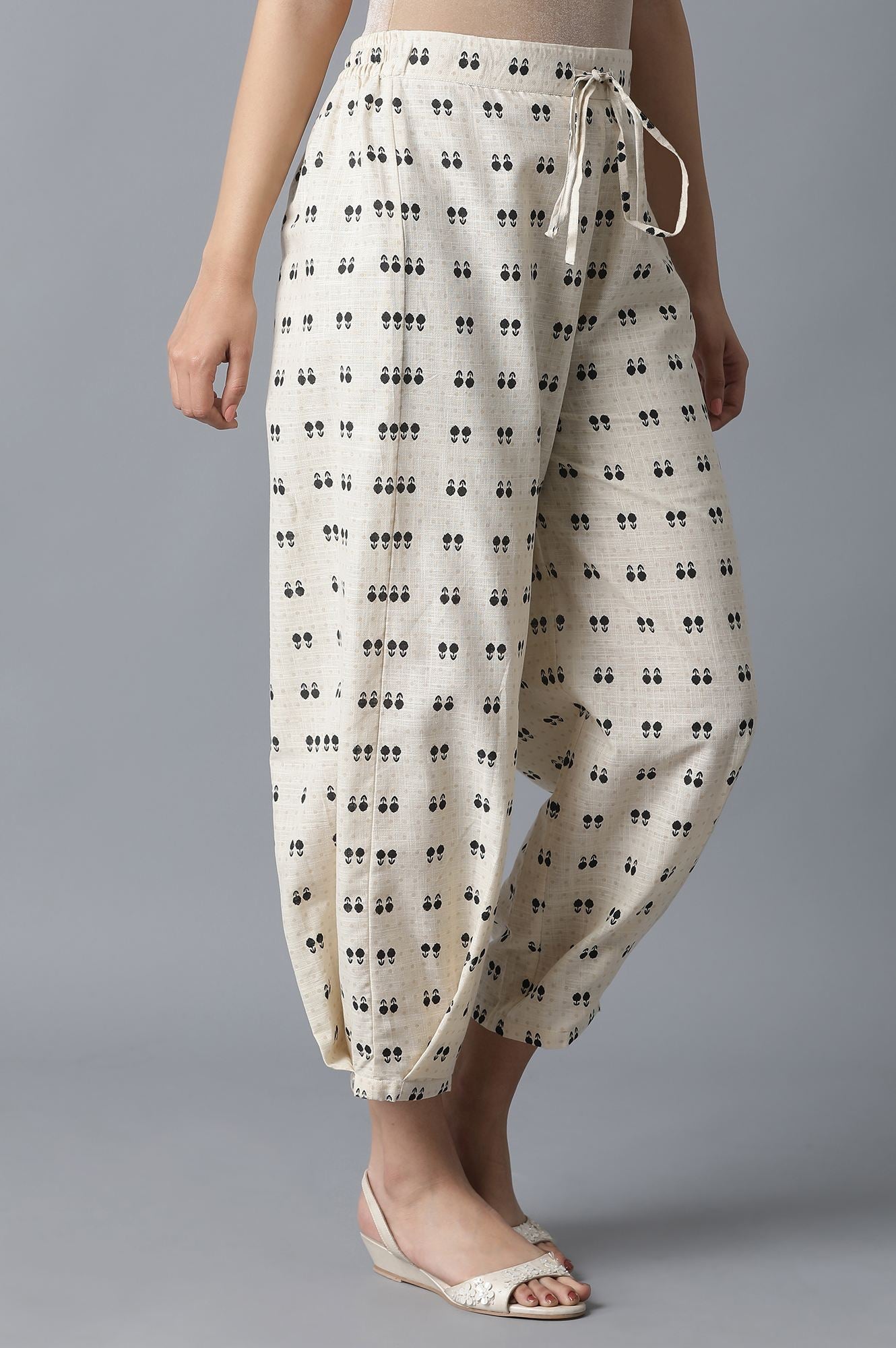 Ecru Ikkat Printed Carrot Pants