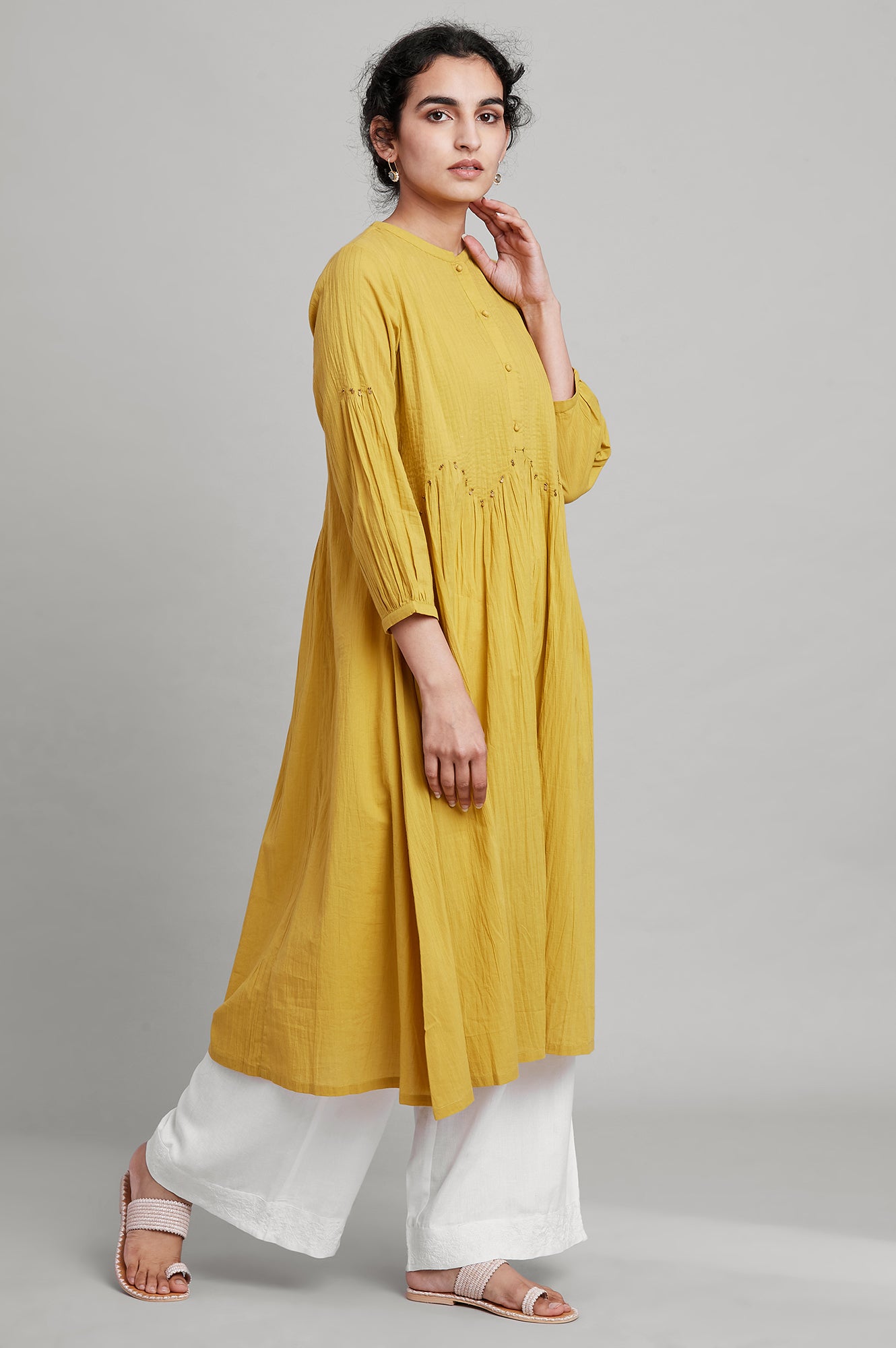 Yellow Pleated Solid kurta