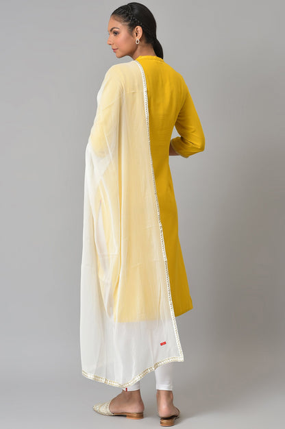 Yellow Embroidered kurta With White Tights And Dupatta.