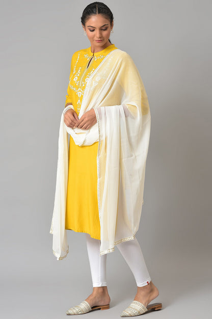 Yellow Embroidered kurta With White Tights And Dupatta.