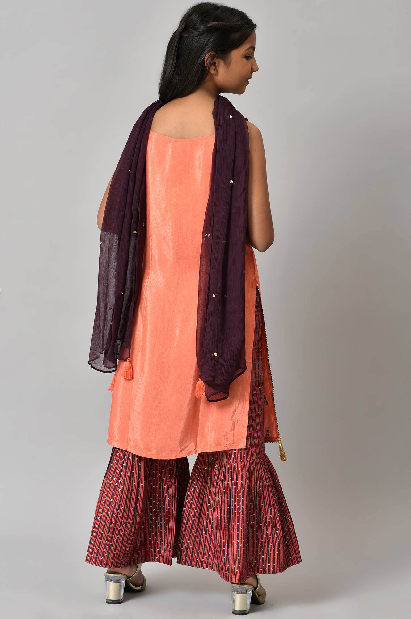 LIVA Girls Orange Embroidered kurta with Purple Sharar and Dupatta