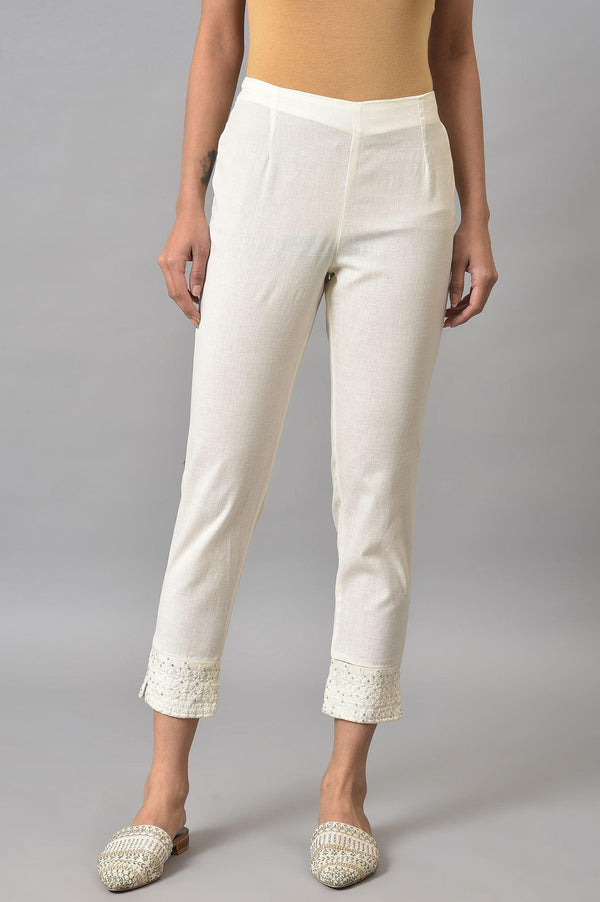 Ecru Slim Pants with Embroidered Hem