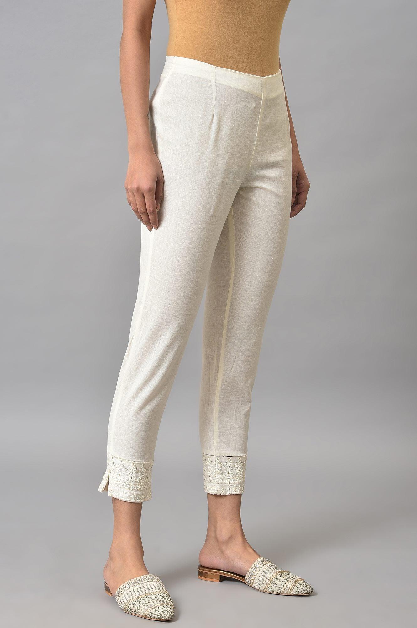 Ecru Slim Pants With Embroidered Hem - wforwoman