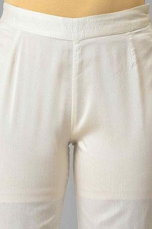 Ecru Solid Light Festive Slim Pants - wforwoman