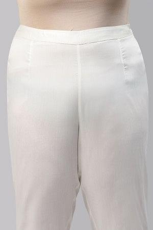 Ecru Solid Light Festive Plus Size Slim Pants - wforwoman