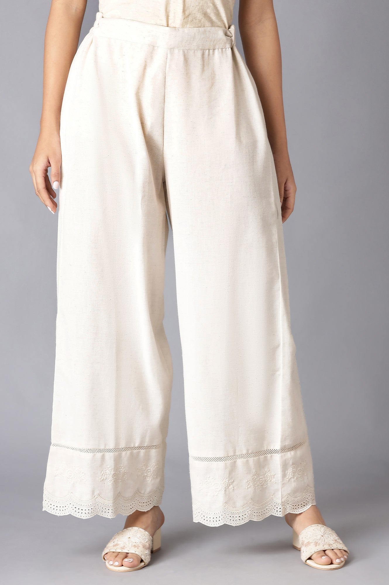 Ecru Parallel Pants With Embroidery Hemline