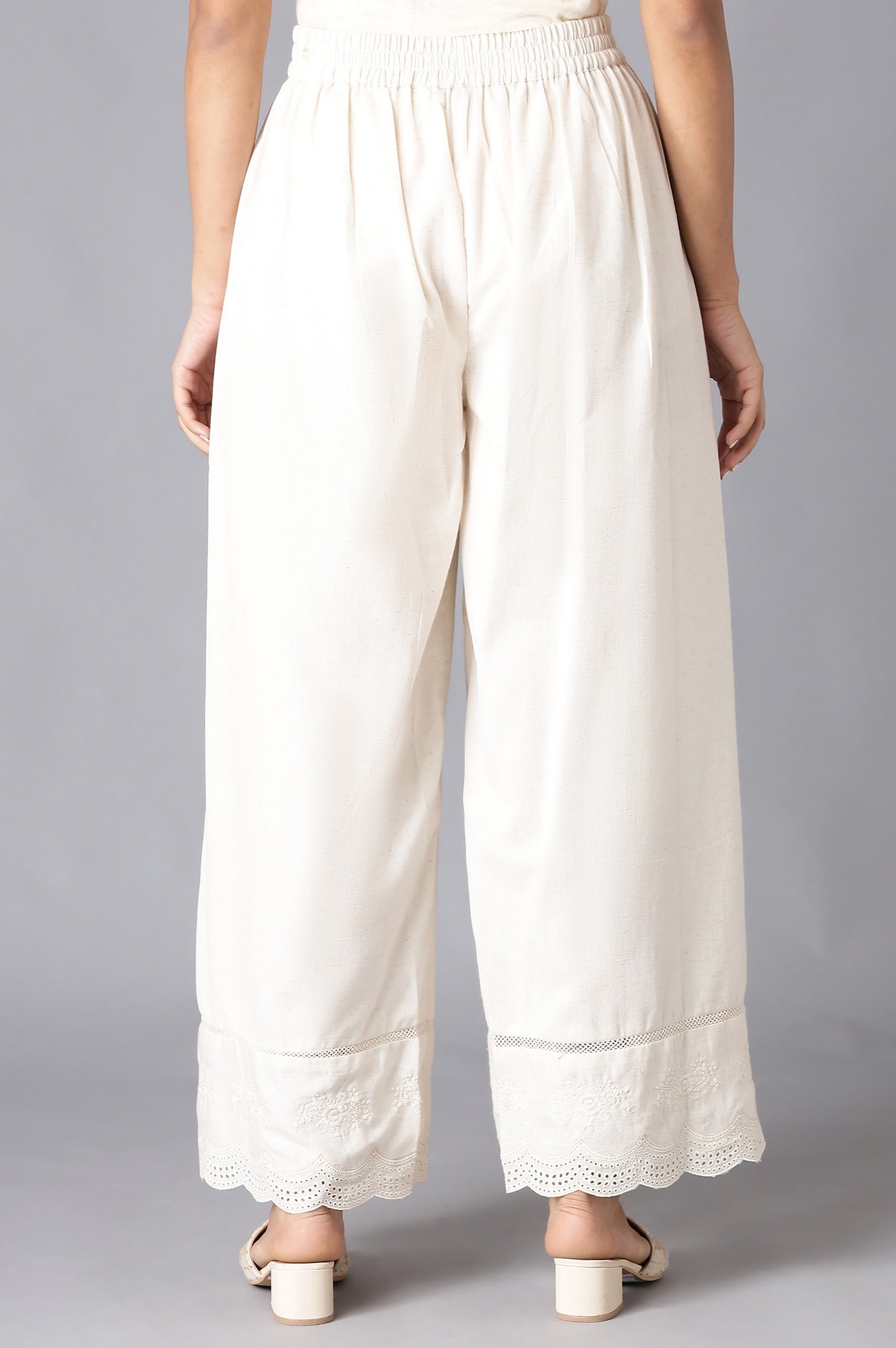 Ecru Parallel Pants With Embroidery Hemline