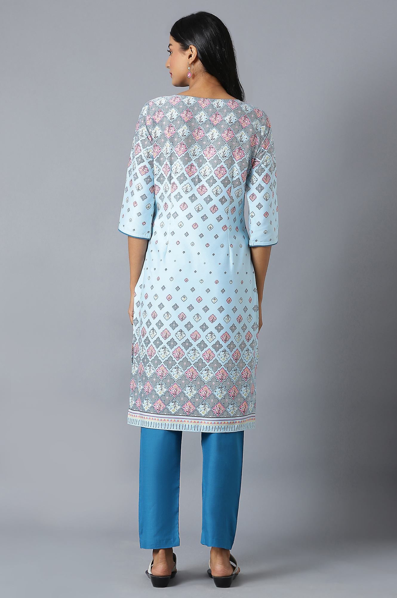 Sky Blue Floral Printed kurta In Round Neck With Blue Solid Trousers