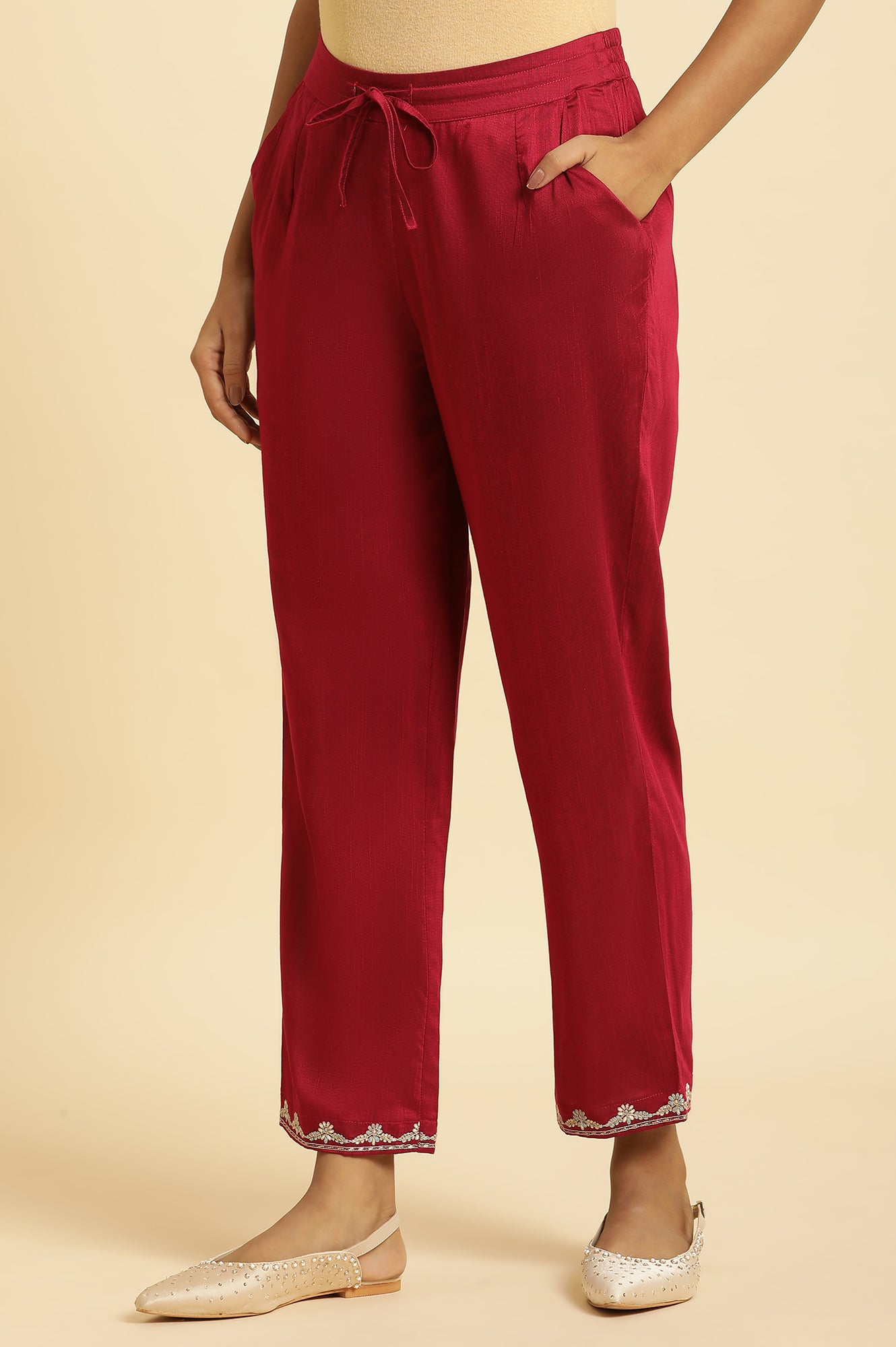 Magenta Solid Pants With Embroidery On Hem