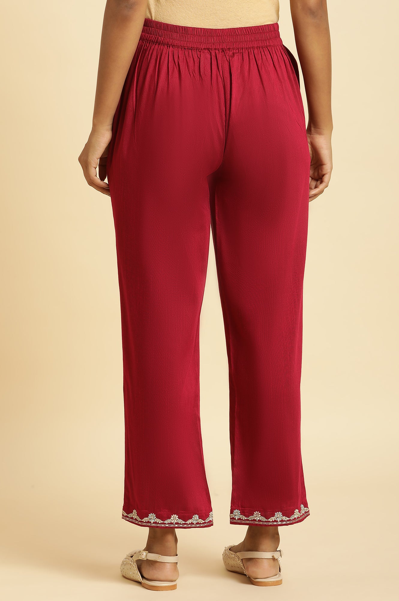 Magenta Solid Pants With Embroidery On Hem