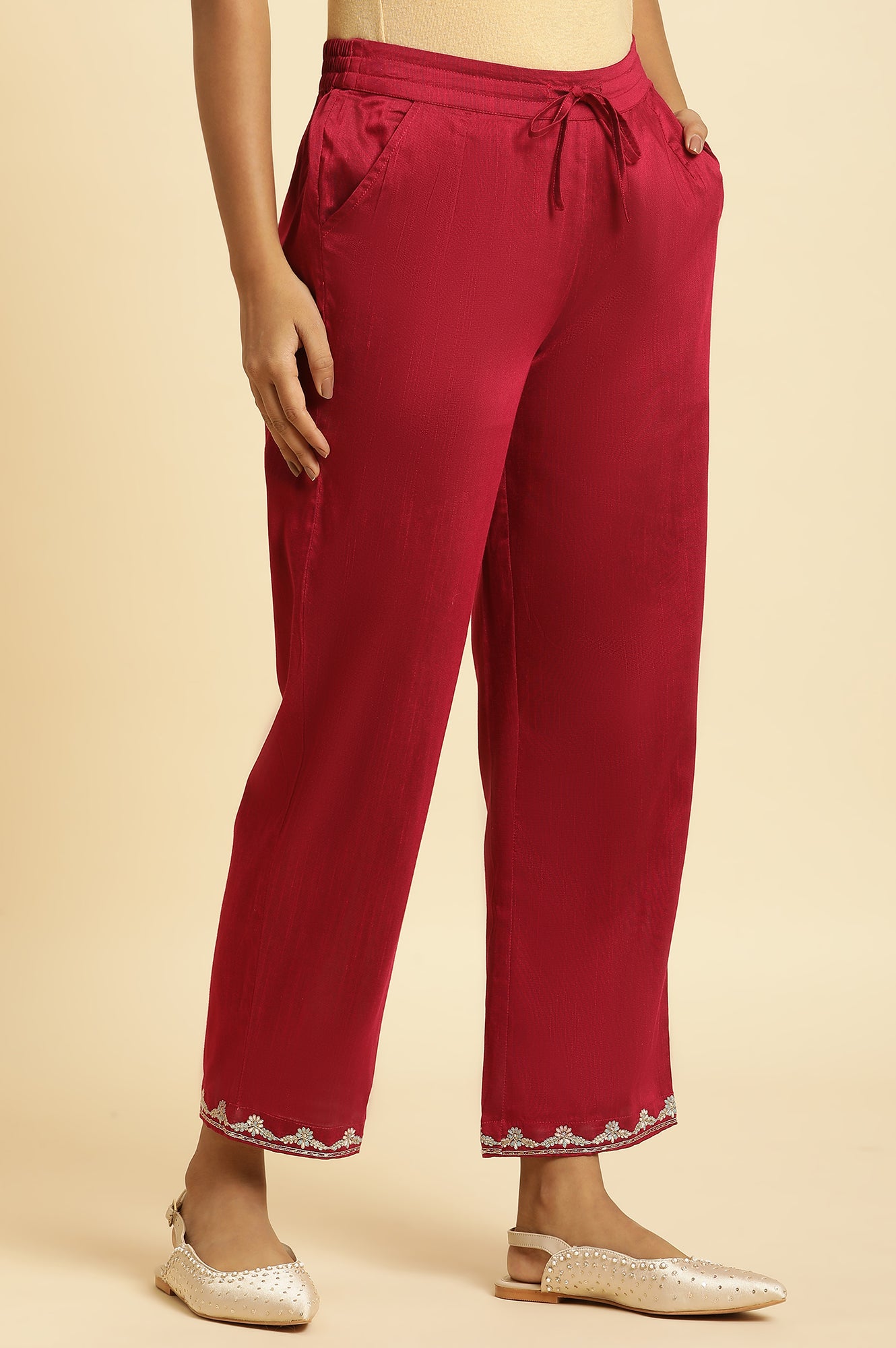 Magenta Solid Pants With Embroidery On Hem