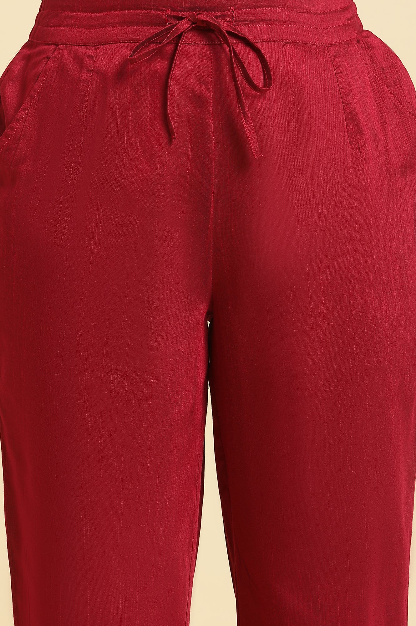 Magenta Solid Pants With Embroidery On Hem