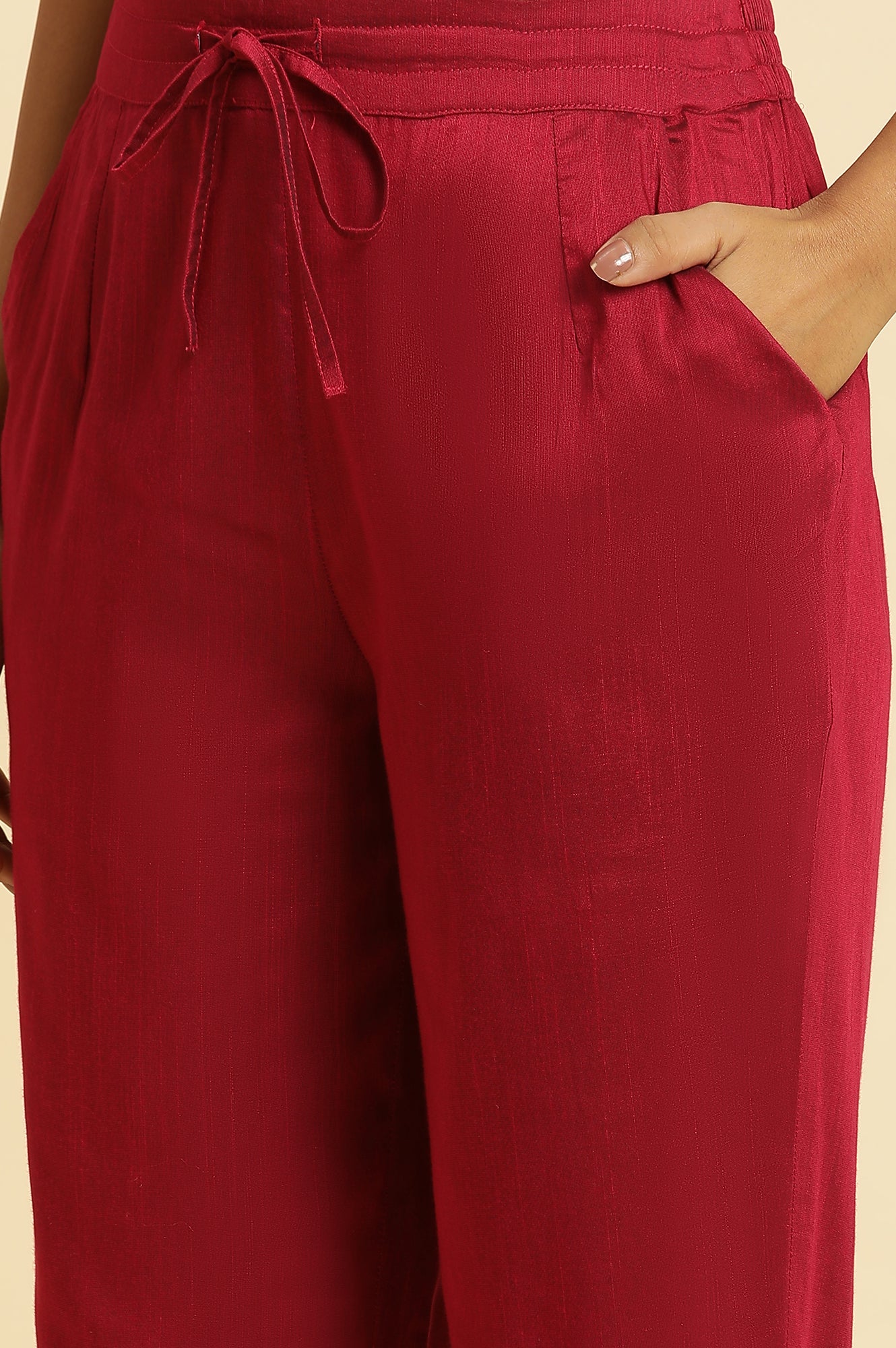 Magenta Solid Pants With Embroidery On Hem