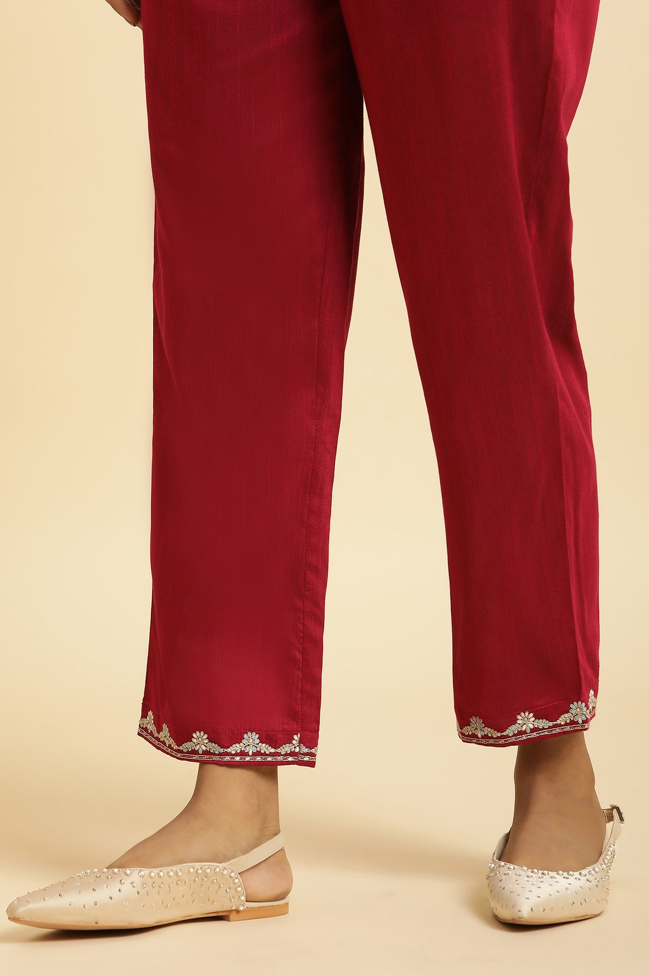 Magenta Solid Pants With Embroidery On Hem