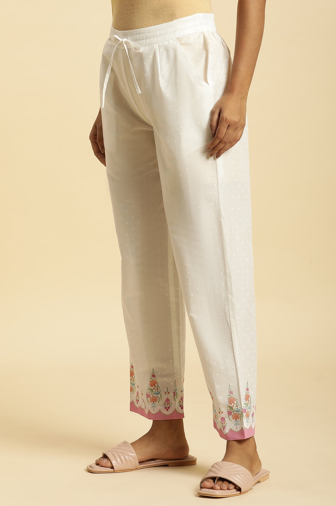 Ecru Straight Pants With Printed Hemline