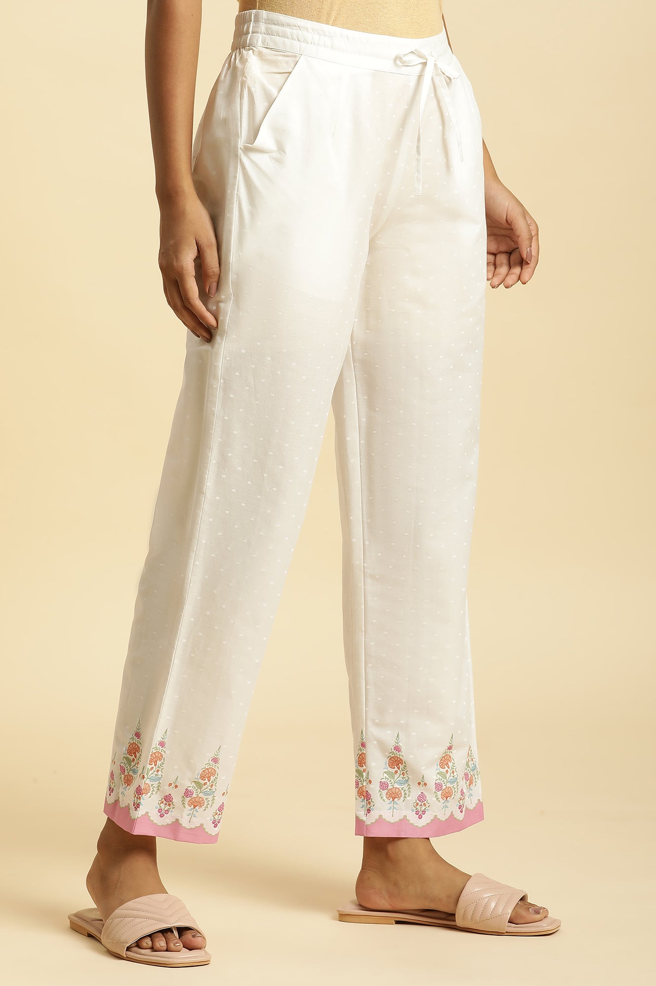 Ecru Straight Pants With Printed Hemline