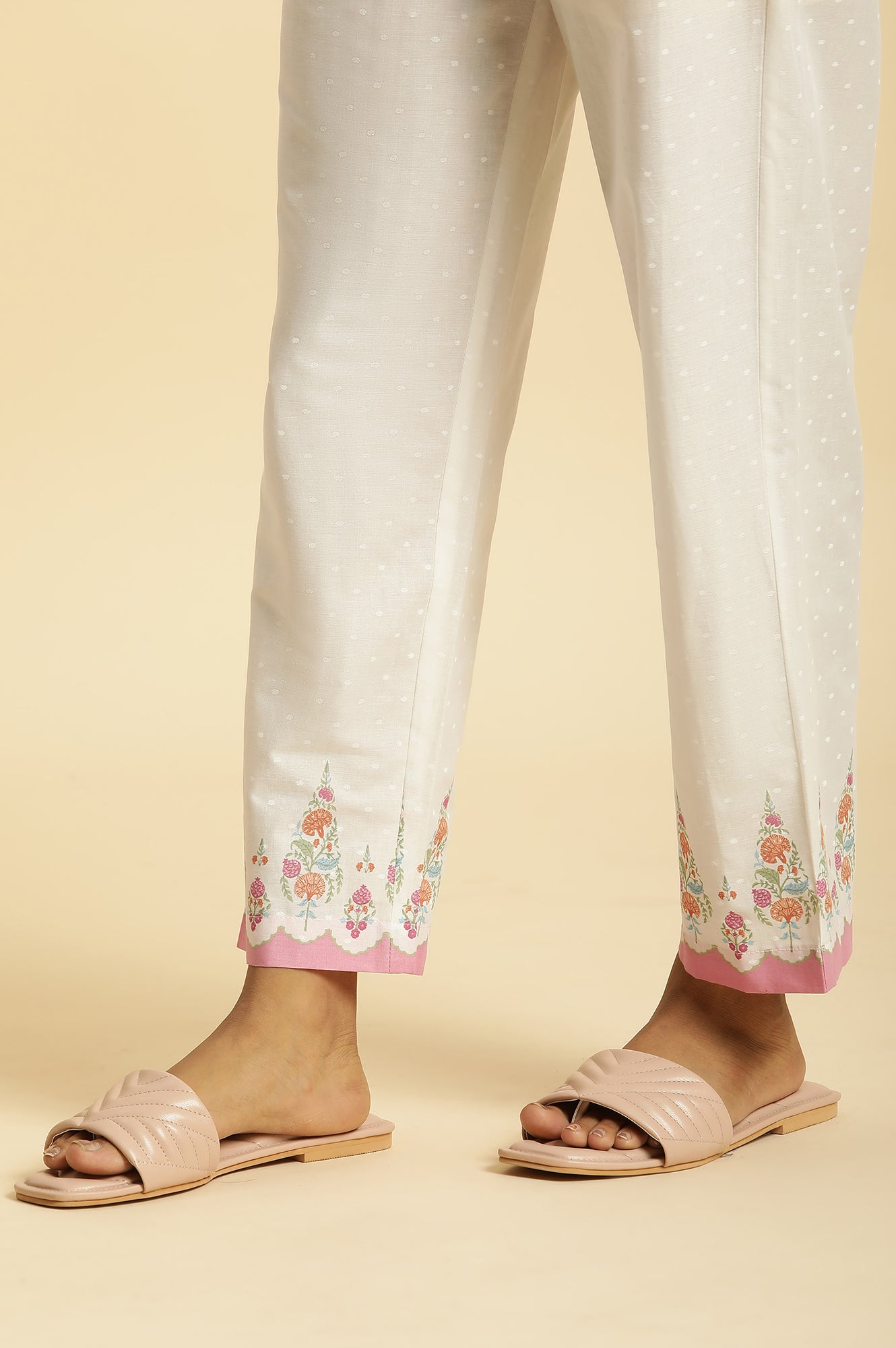 Ecru Straight Pants With Printed Hemline