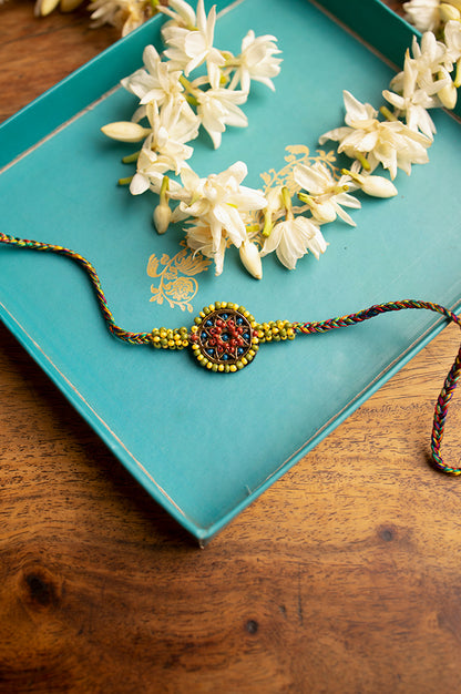 Multi-Colour Braided Rakhi With Beaded And Tassels