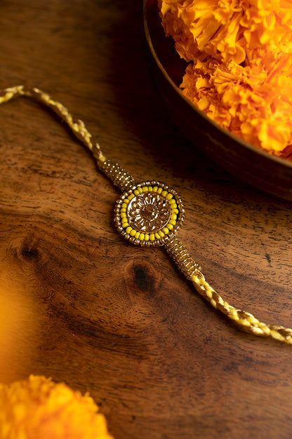 Yellow And Gold Beaded Rakhi With Tassels