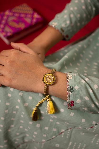 Yellow And Gold Beaded Rakhi With Tassels