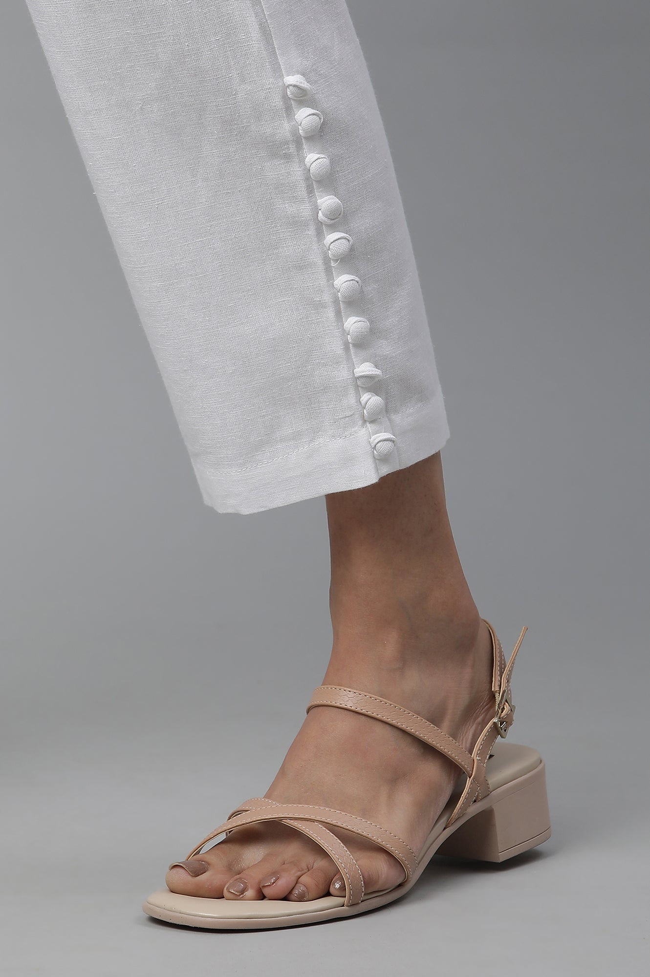 White Narrow Trousers with Buttons on Hemline