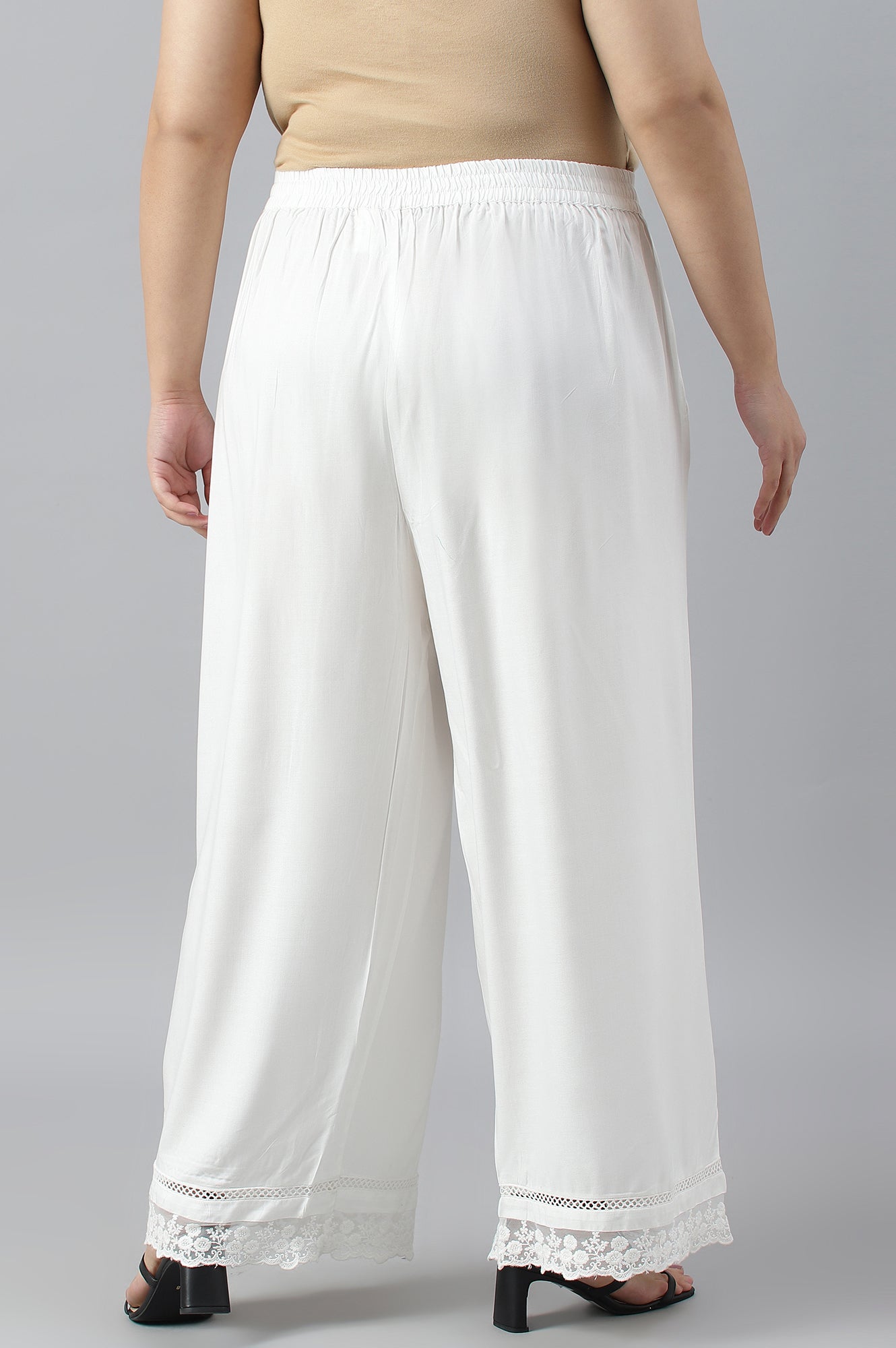 Ecru Parallel Pants With Lace At Hemline