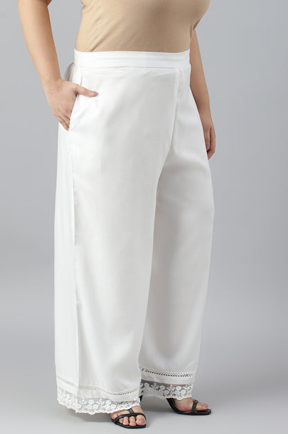 Ecru Parallel Pants With Lace At Hemline