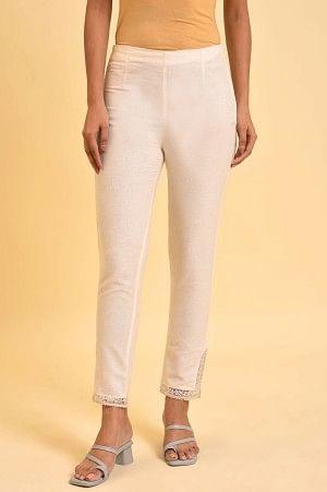 Plus Size Ecru Solid Slim Pants With Lace On Hem - wforwoman