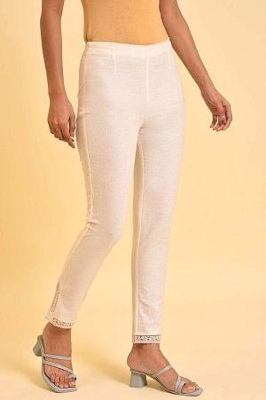 Plus Size Ecru Solid Slim Pants With Lace On Hem - wforwoman