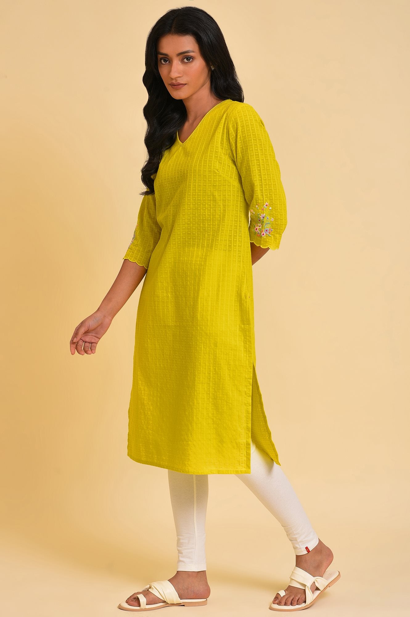 Yellow Dobby Textured Kurta And Tights Set