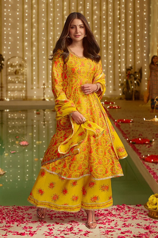 Mustard Yellow Floral Printed Chanderi Anarkali Kurta With Embroidery, Flared Pants And Dupatta Set