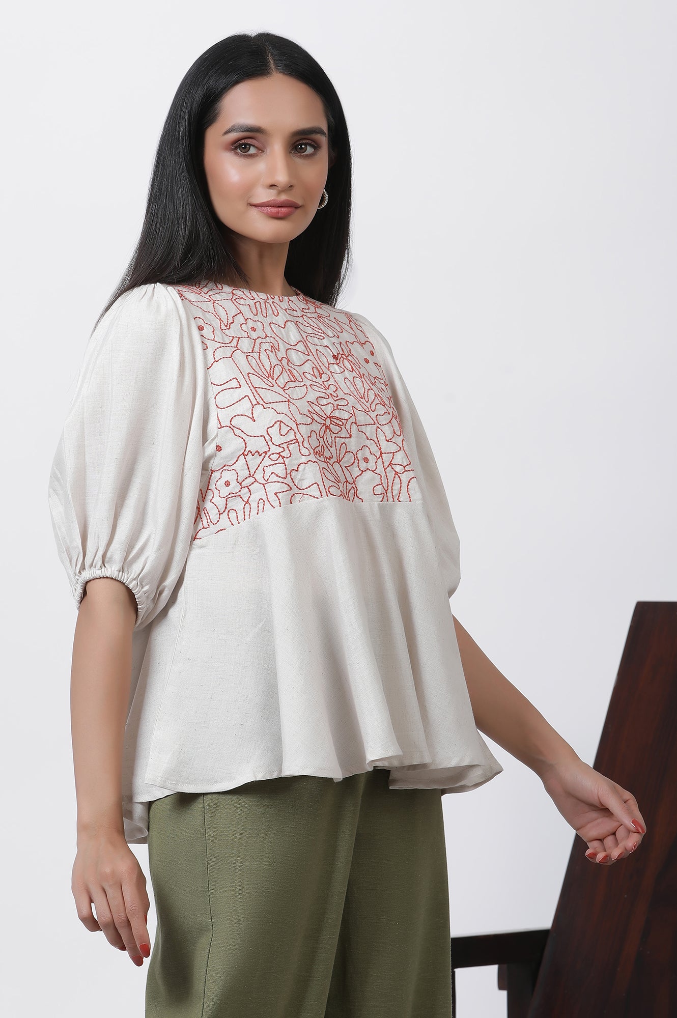 White Thread Embroidered Peplum Top