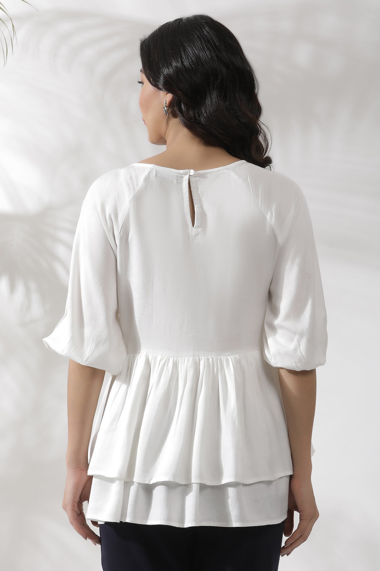 White Embroidered Peplum Top