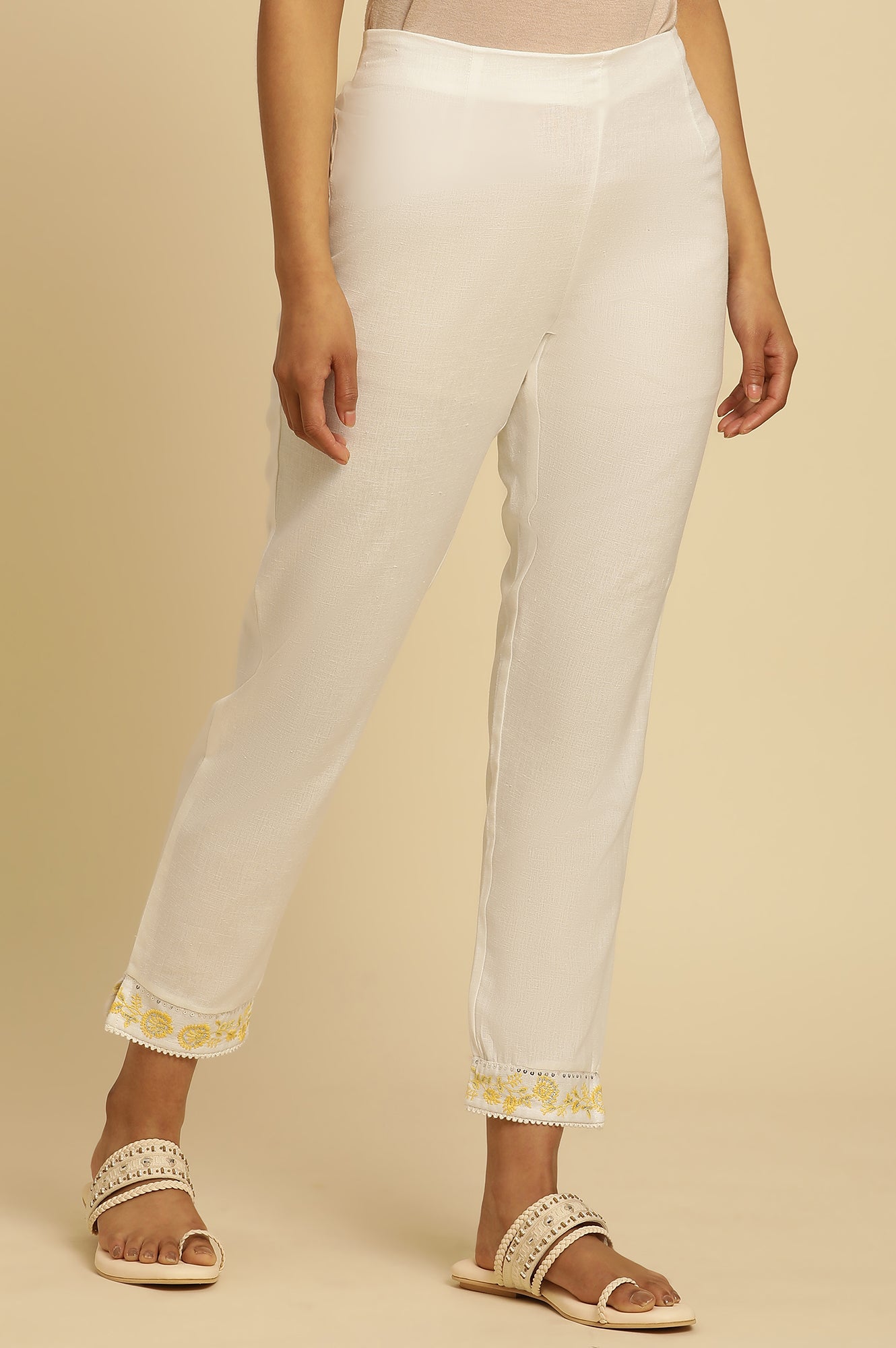 Ecru Solid Straight Pants With Embroidered Hemline