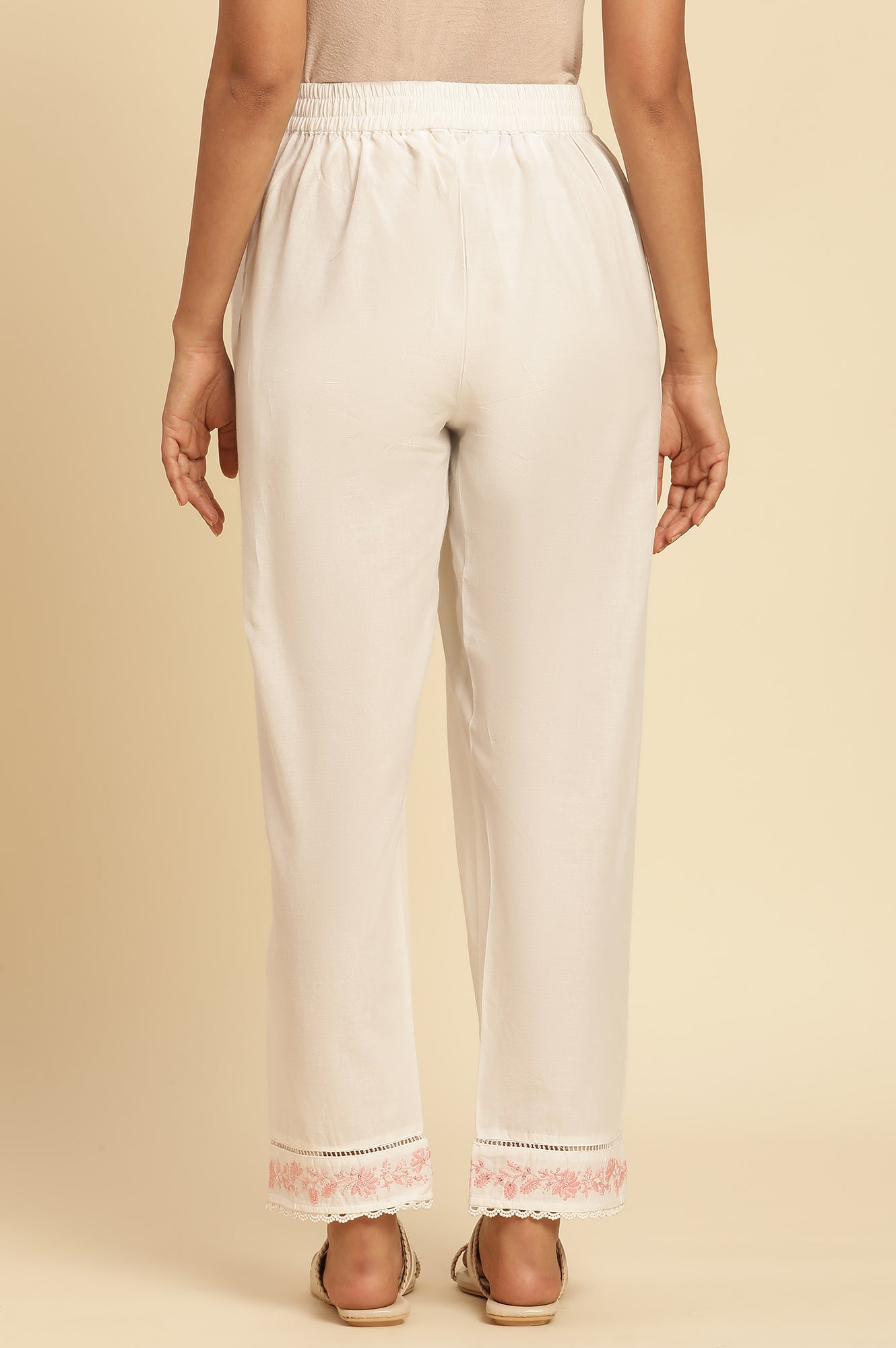 Ecru Solid Straight Pants With Embroidered Hemline