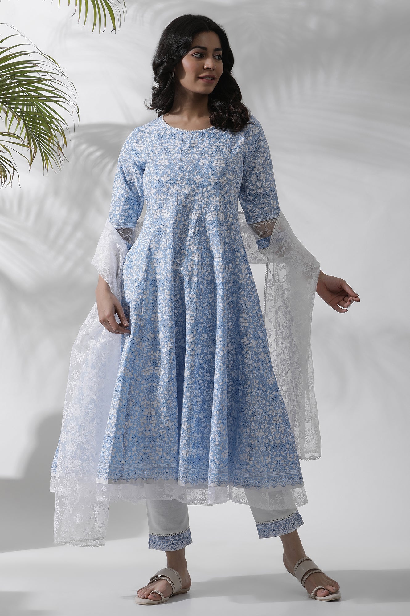 Light Blue Floral Printed Flared Kurta, Pants And Dupatta Set