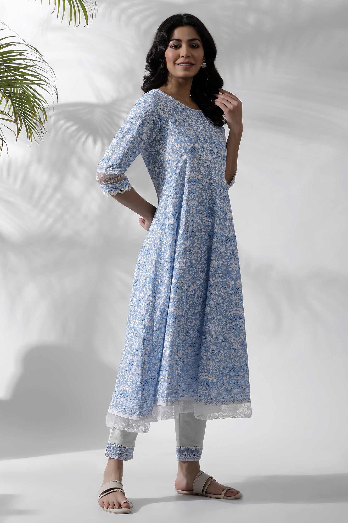 Light Blue Floral Printed Flared Kurta, Pants And Dupatta Set