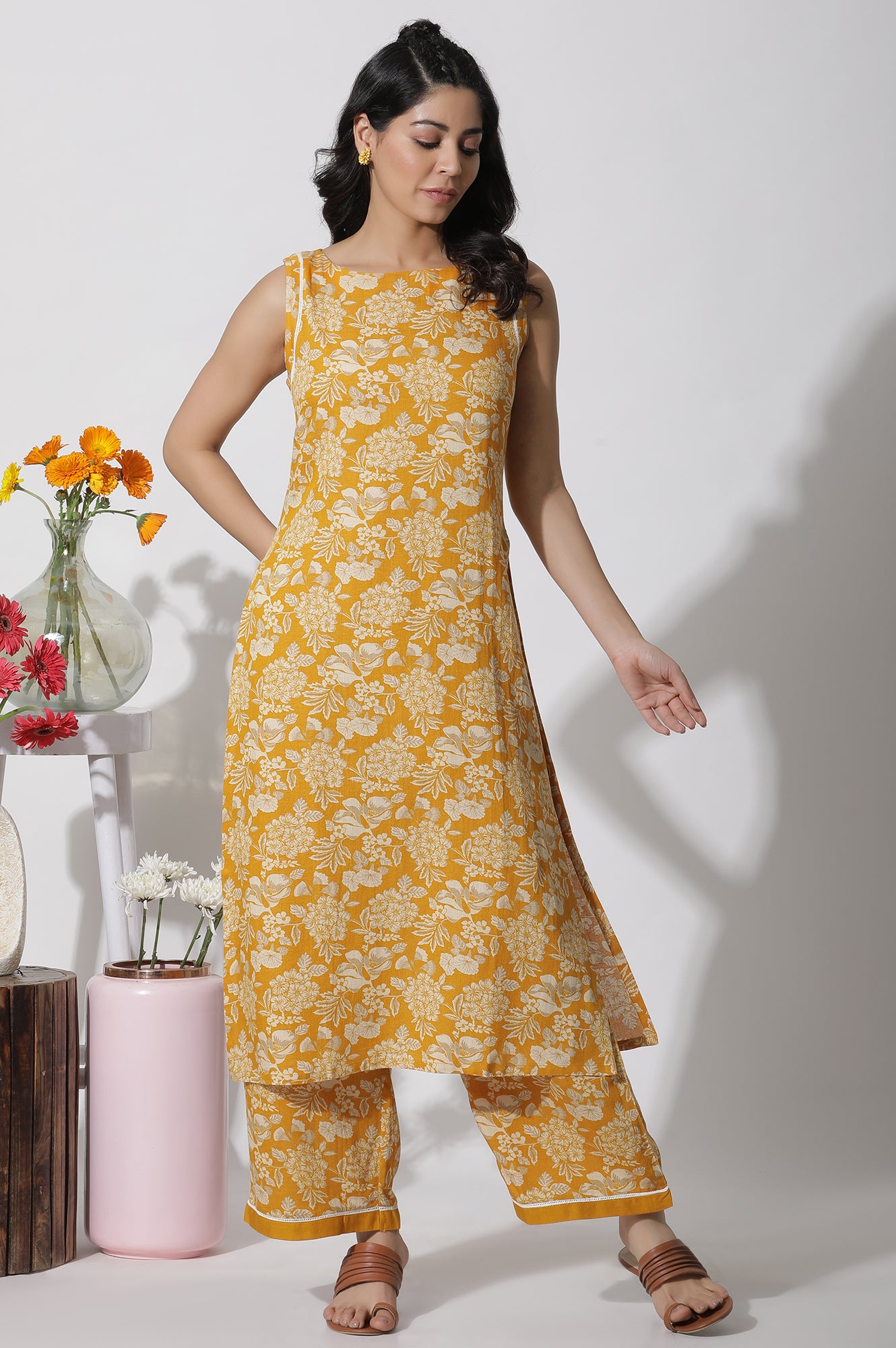 Mustard Floral Printed A-Line Kurta And Flared Pants Set