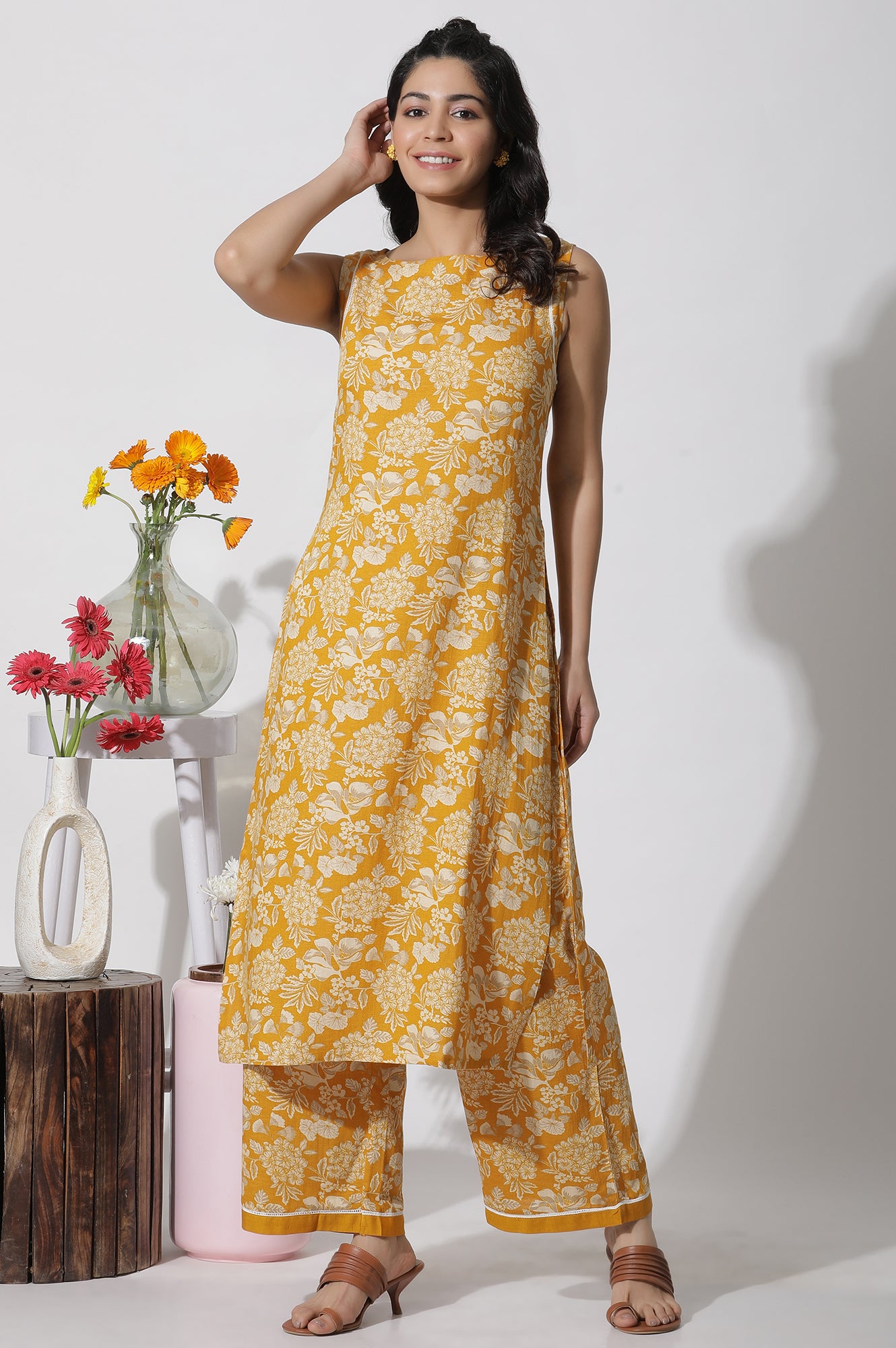 Mustard Floral Printed A-Line Kurta And Flared Pants Set