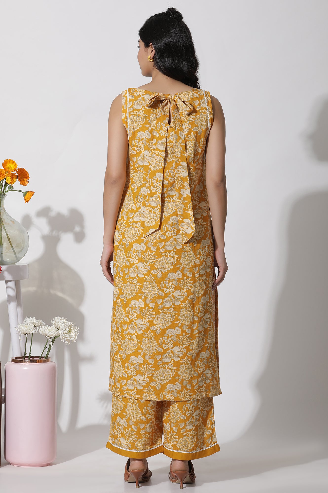 Mustard Floral Printed A-Line Kurta And Flared Pants Set