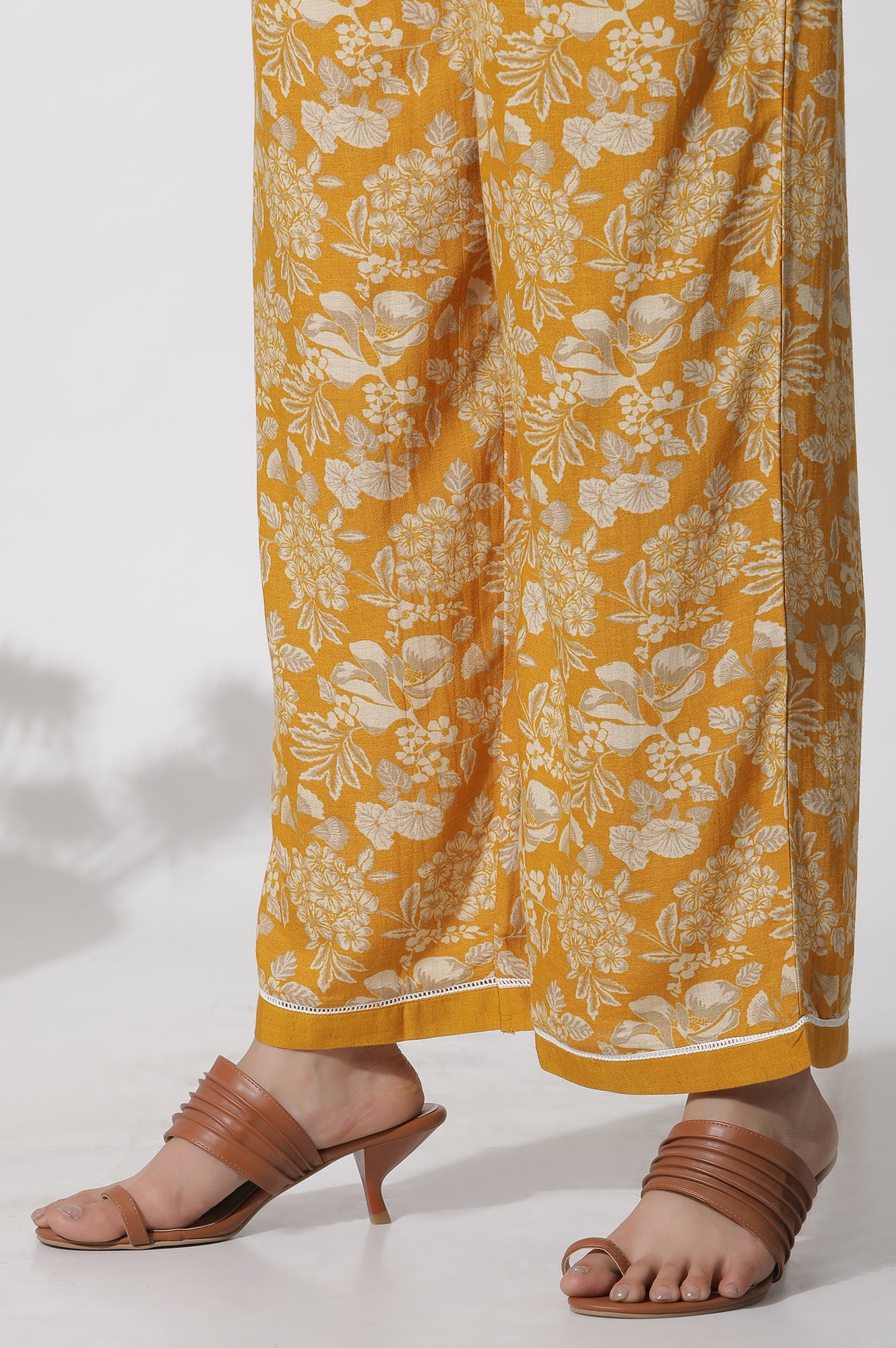 Mustard Floral Printed A-Line Kurta And Flared Pants Set