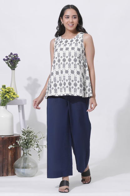 White Schiffli Sleeveless Top And Parallel Pants Set